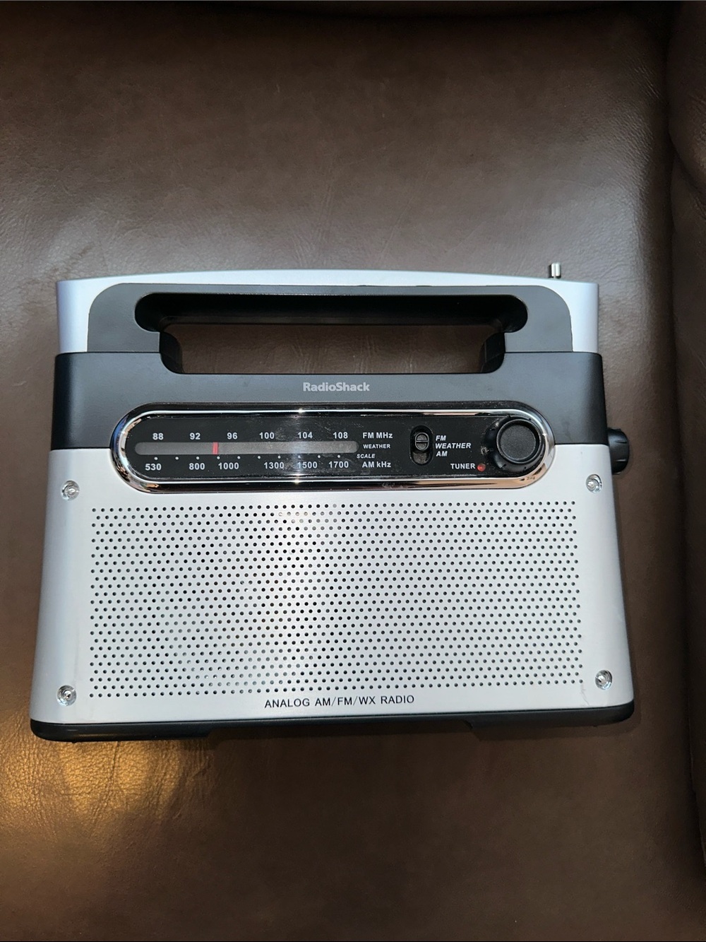 Vintage portable Radio Shack analog AM/FM/WX weather radio with antenna
